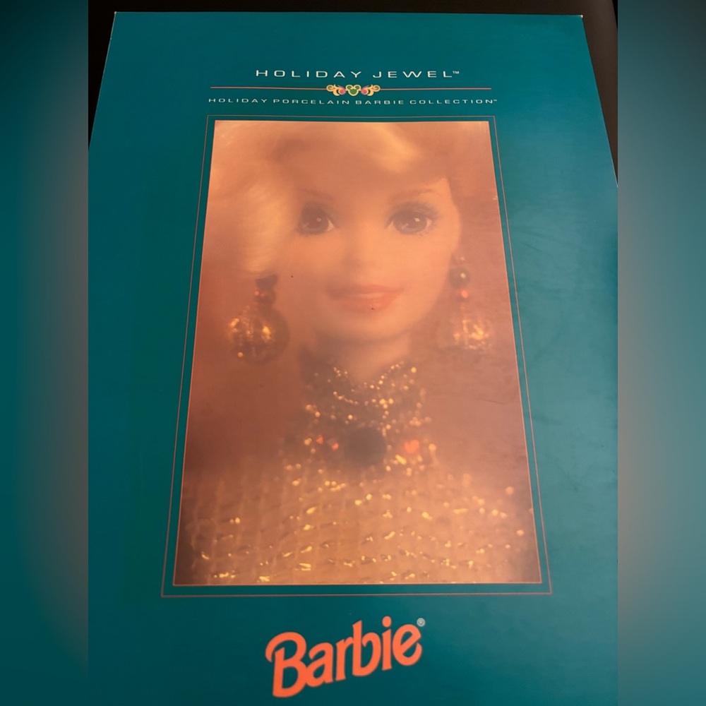 Porcelain Holiday Barbie with Gold Accents
Vintage